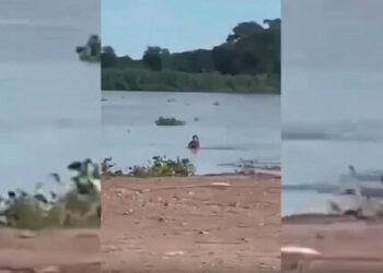 Calor de Corumbá obriga casal a fazer ‘besteirinha’ na Prainha do Porto Geral